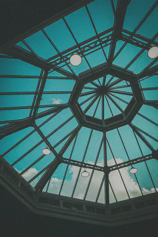 black metal framed glass roof by Christian Lue